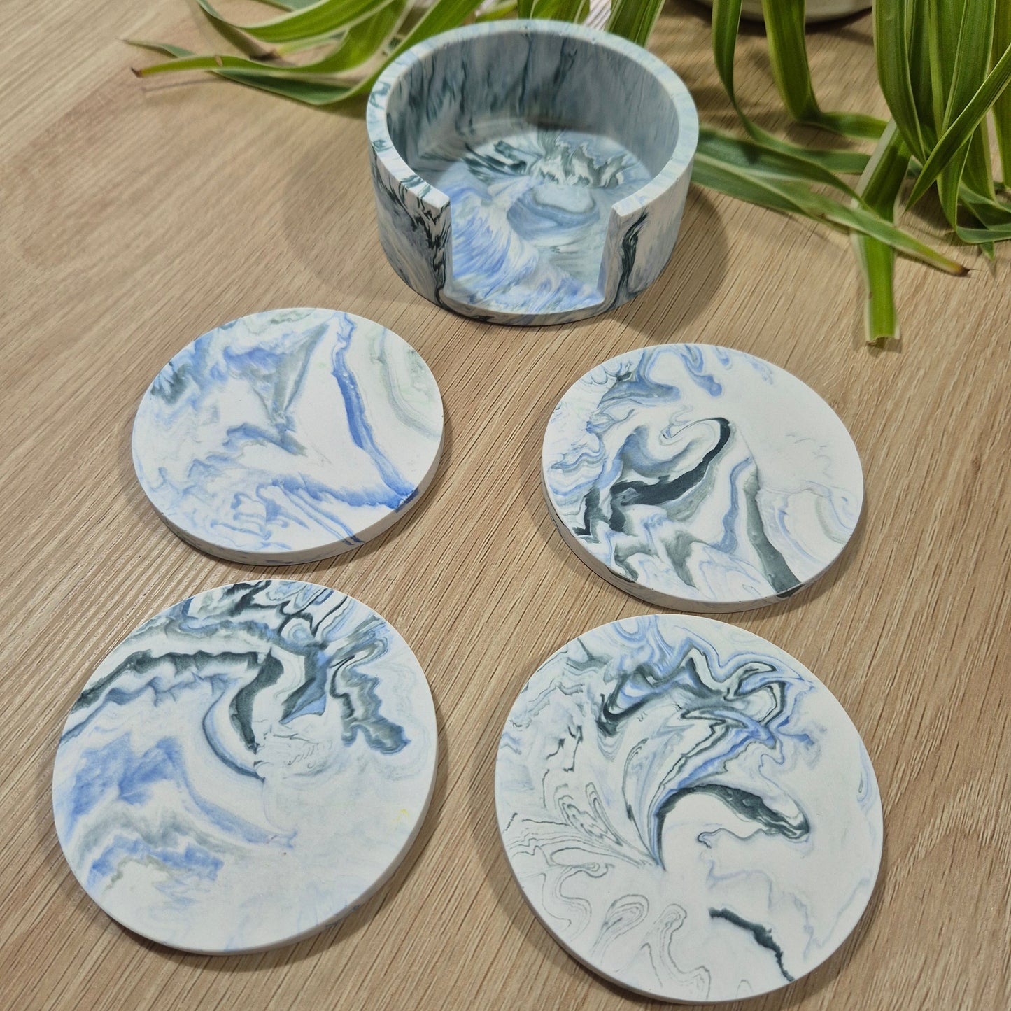 Jesmonite coaster set shown with the matching holder