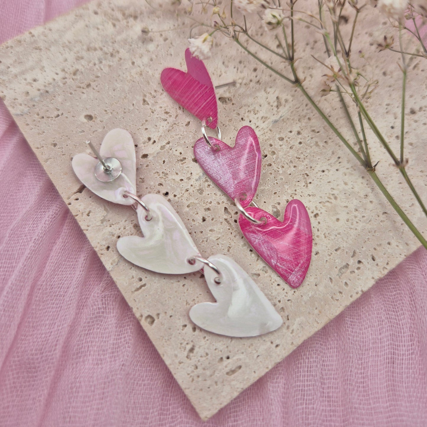 Hand painted art earrings with unique abstract patterns.