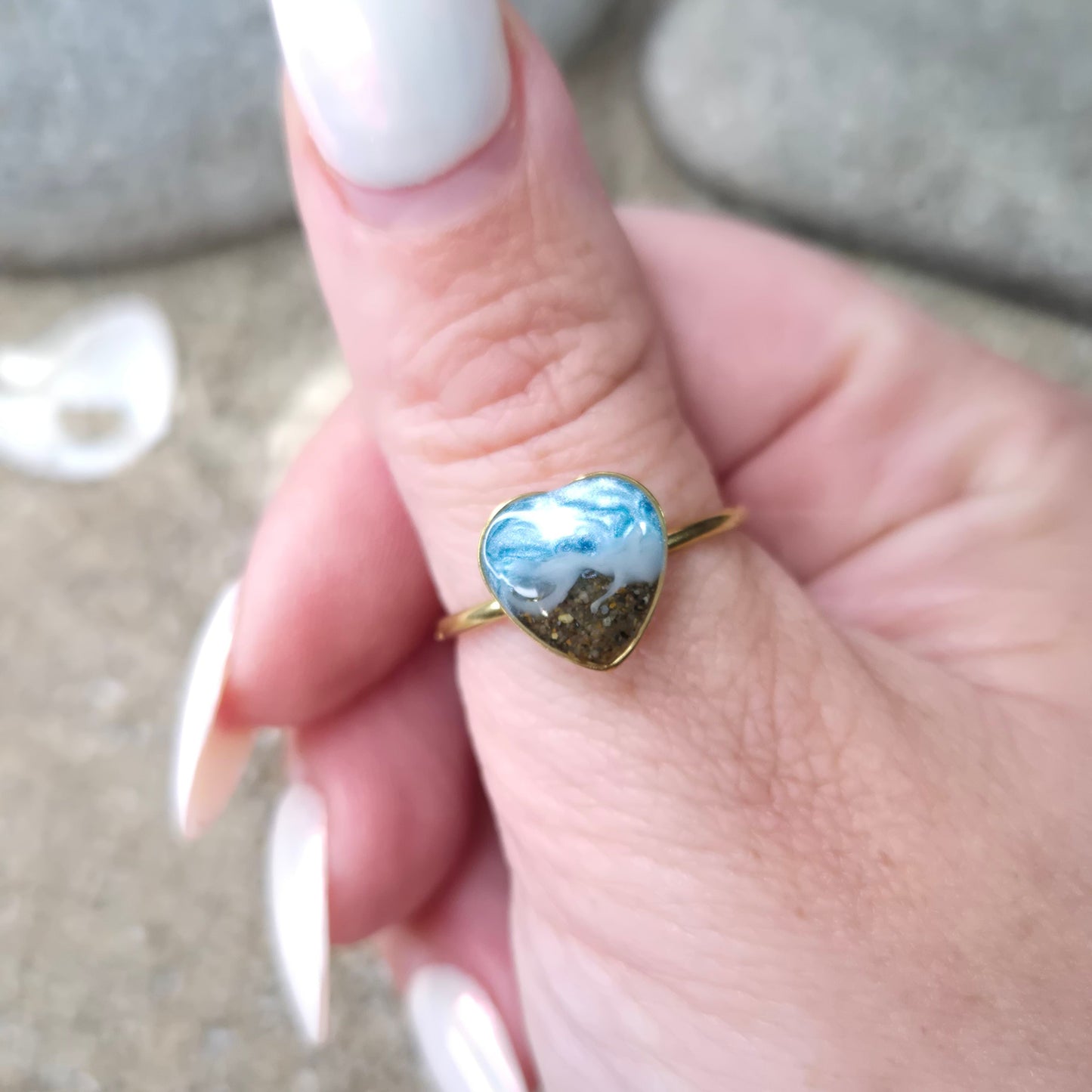 Heart shaped adjustable ring with Welsh beach sand.