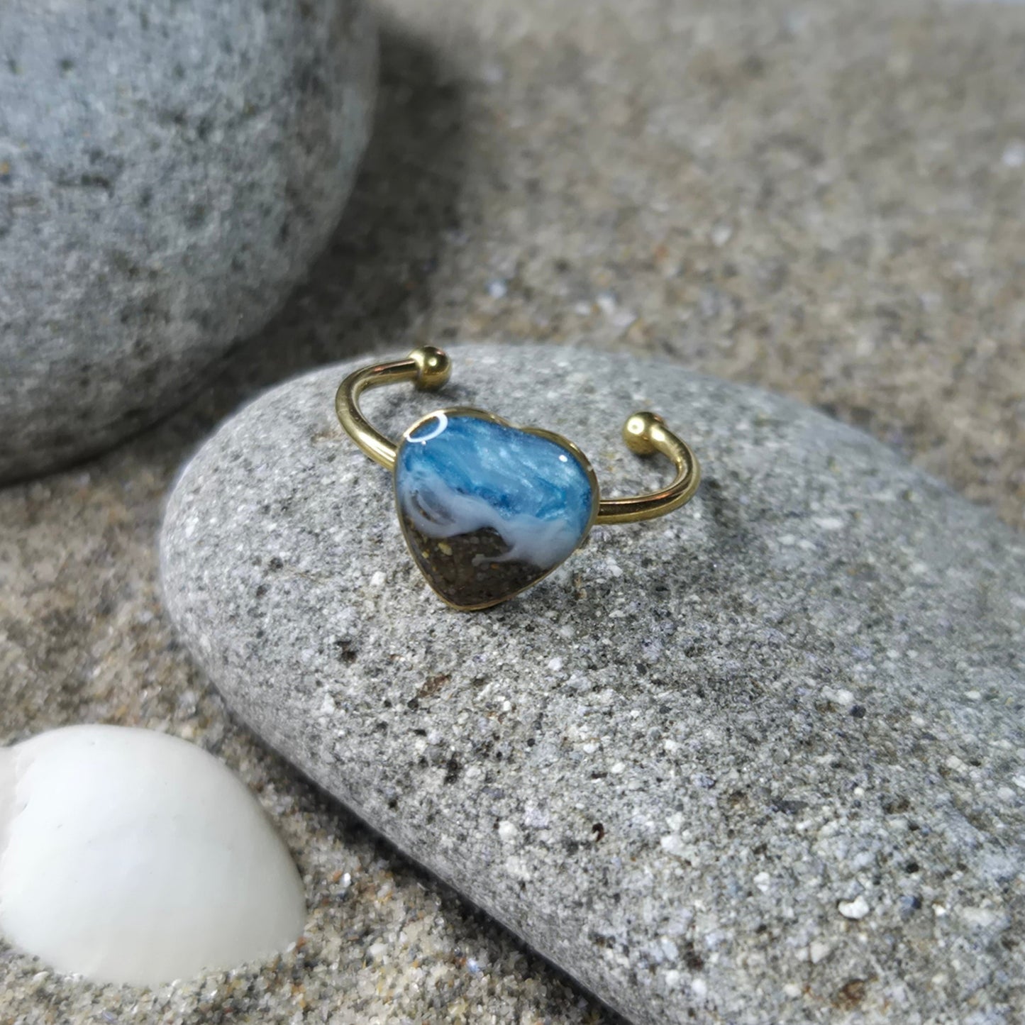 Heart shaped adjustable ring with Welsh beach sand.