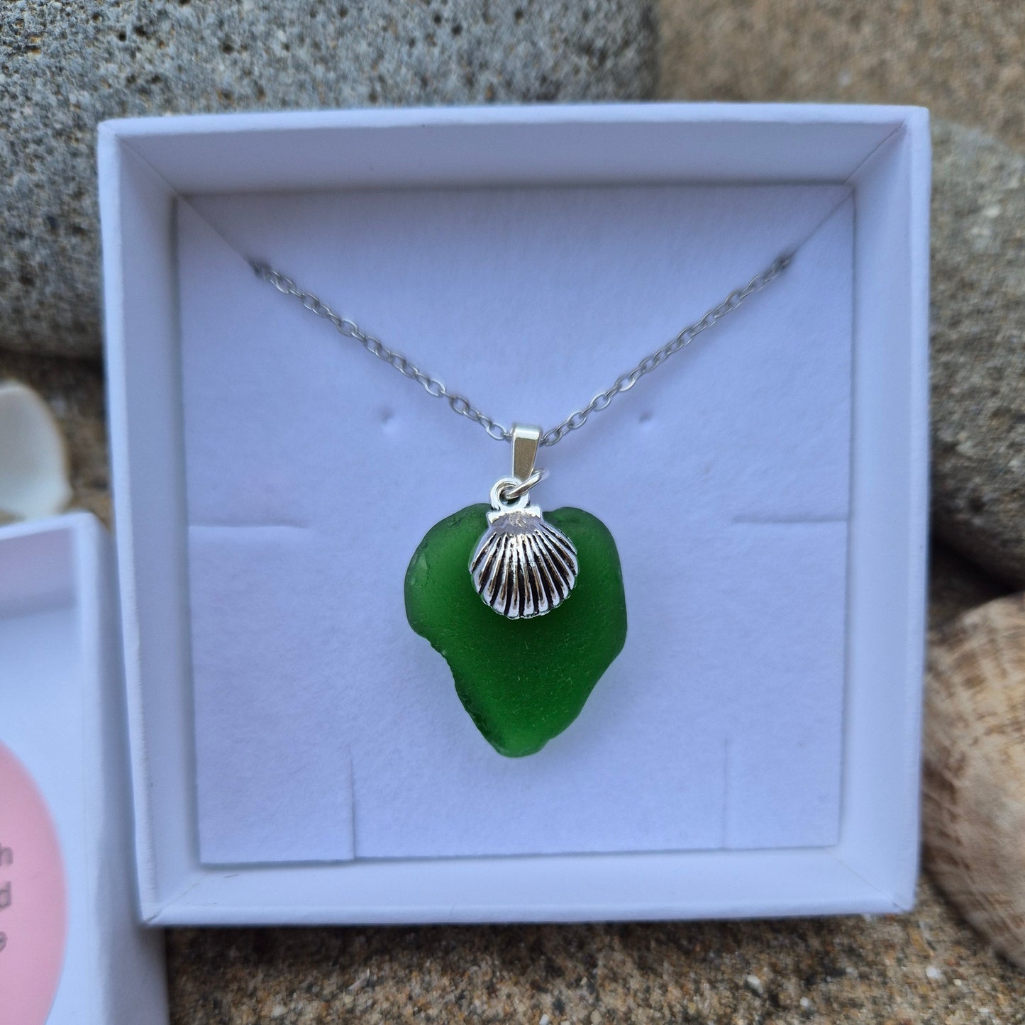 Sea glass necklace with shell charm in a gift box