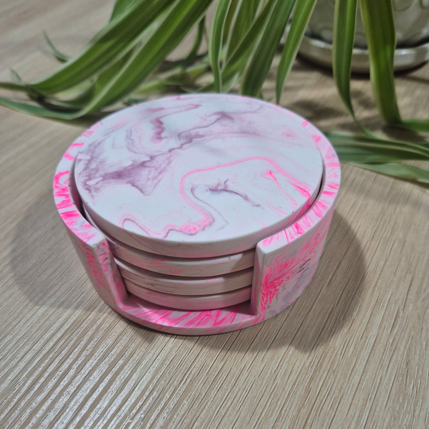 Set of 4 eco resin coasters in holder.