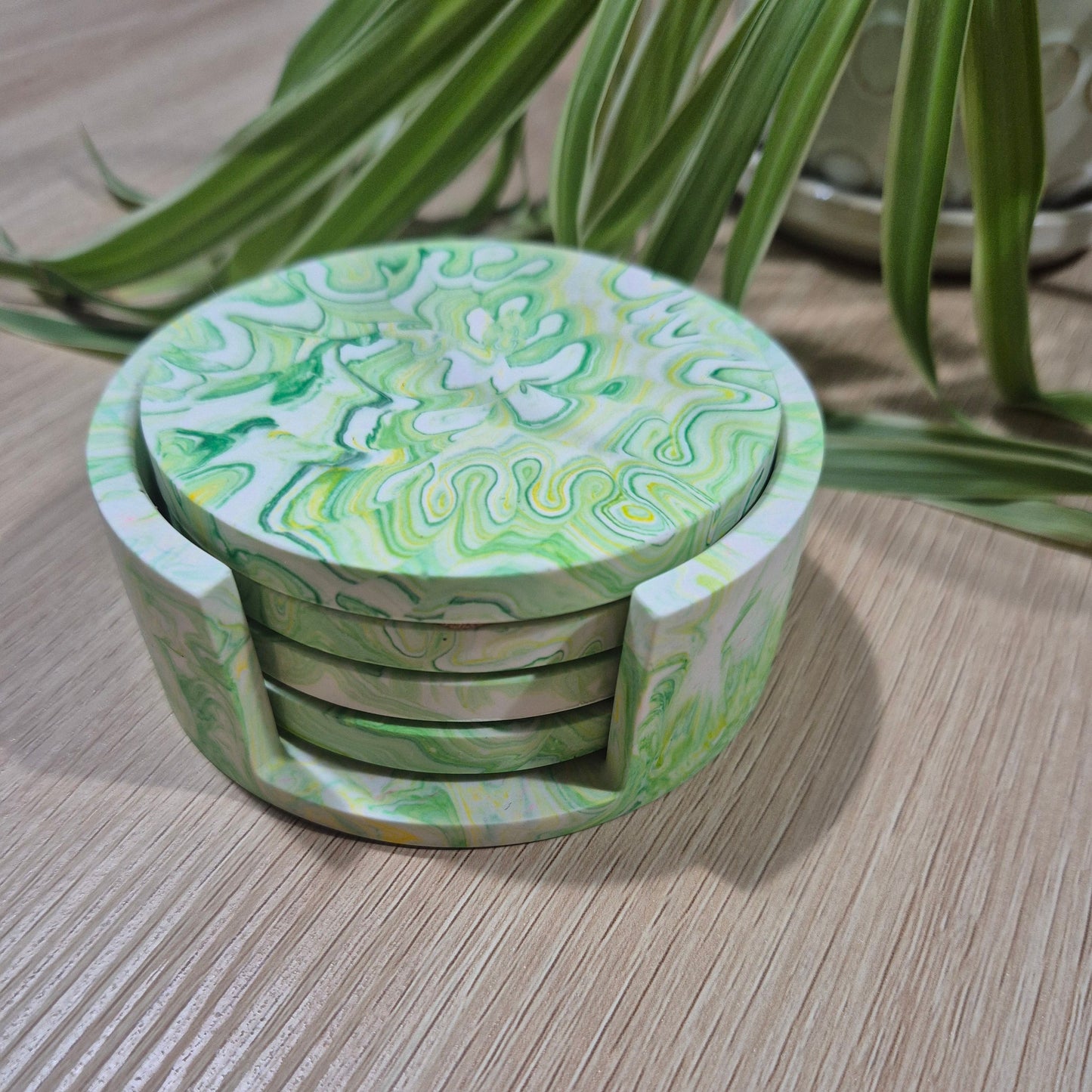 set of 4 coasters , green marbled design with matching holder
