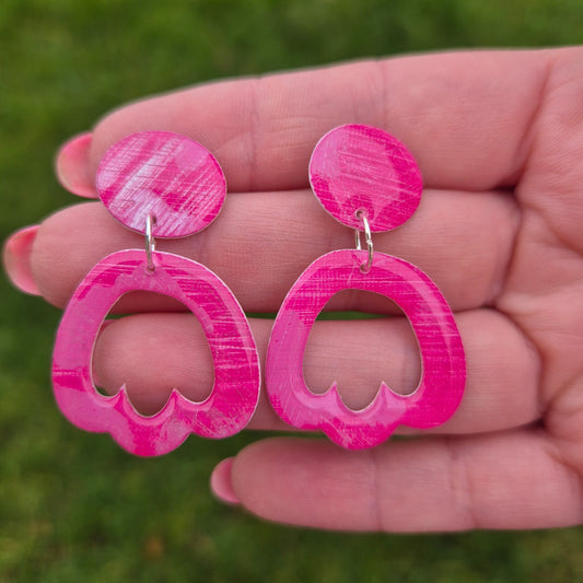 One-of-a-kind earrings cut from original paintings.
