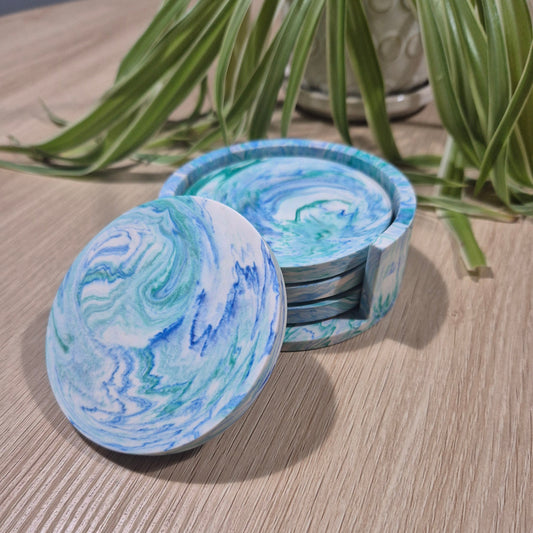 Handmade marbled coaster set in matching holder. Blue and green ocean themed coasters