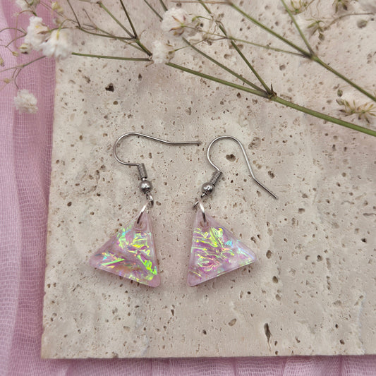 Triangle-shaped statement earrings reflecting colourful light, handmade in Wales