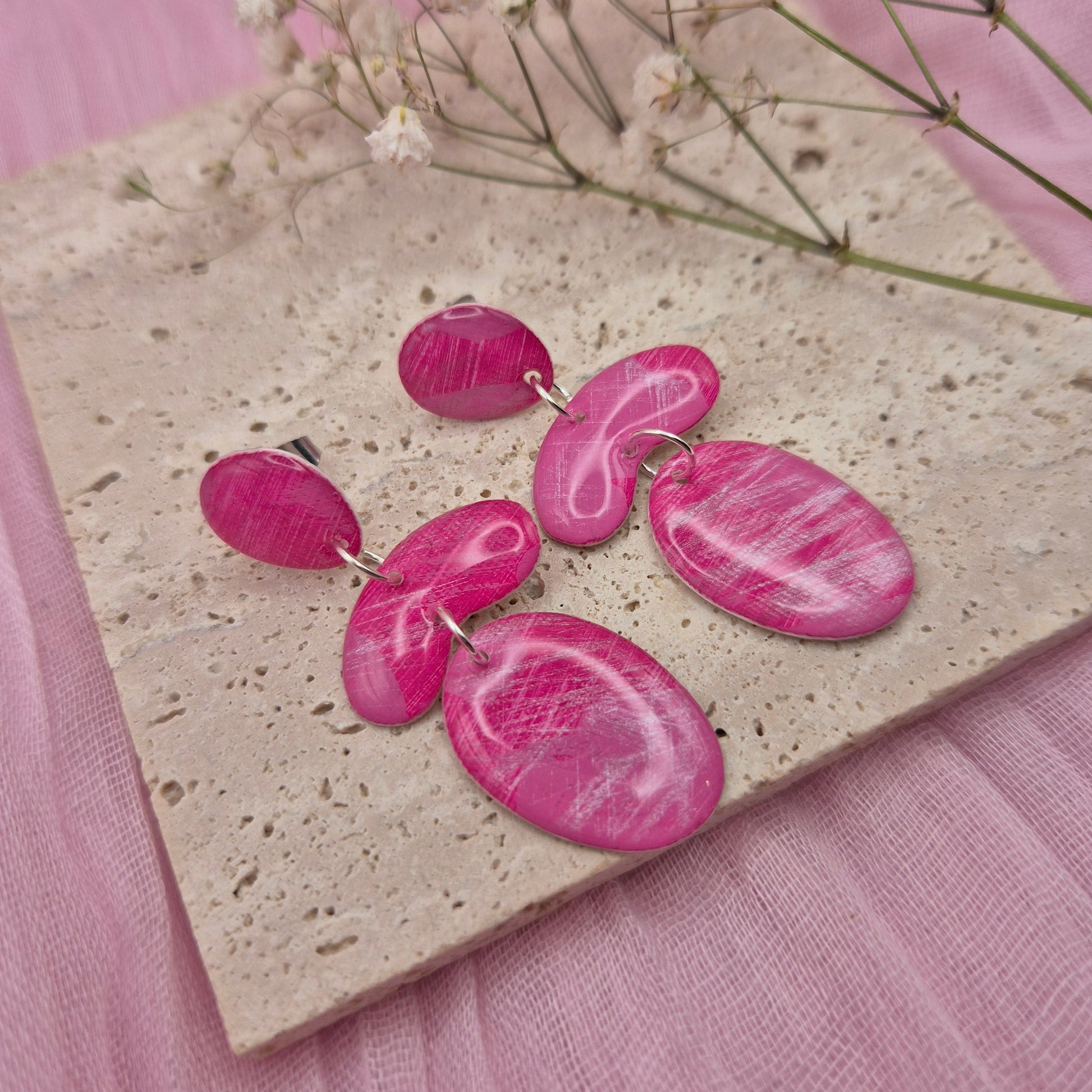 One-of-a-kind earrings cut from original paintings.