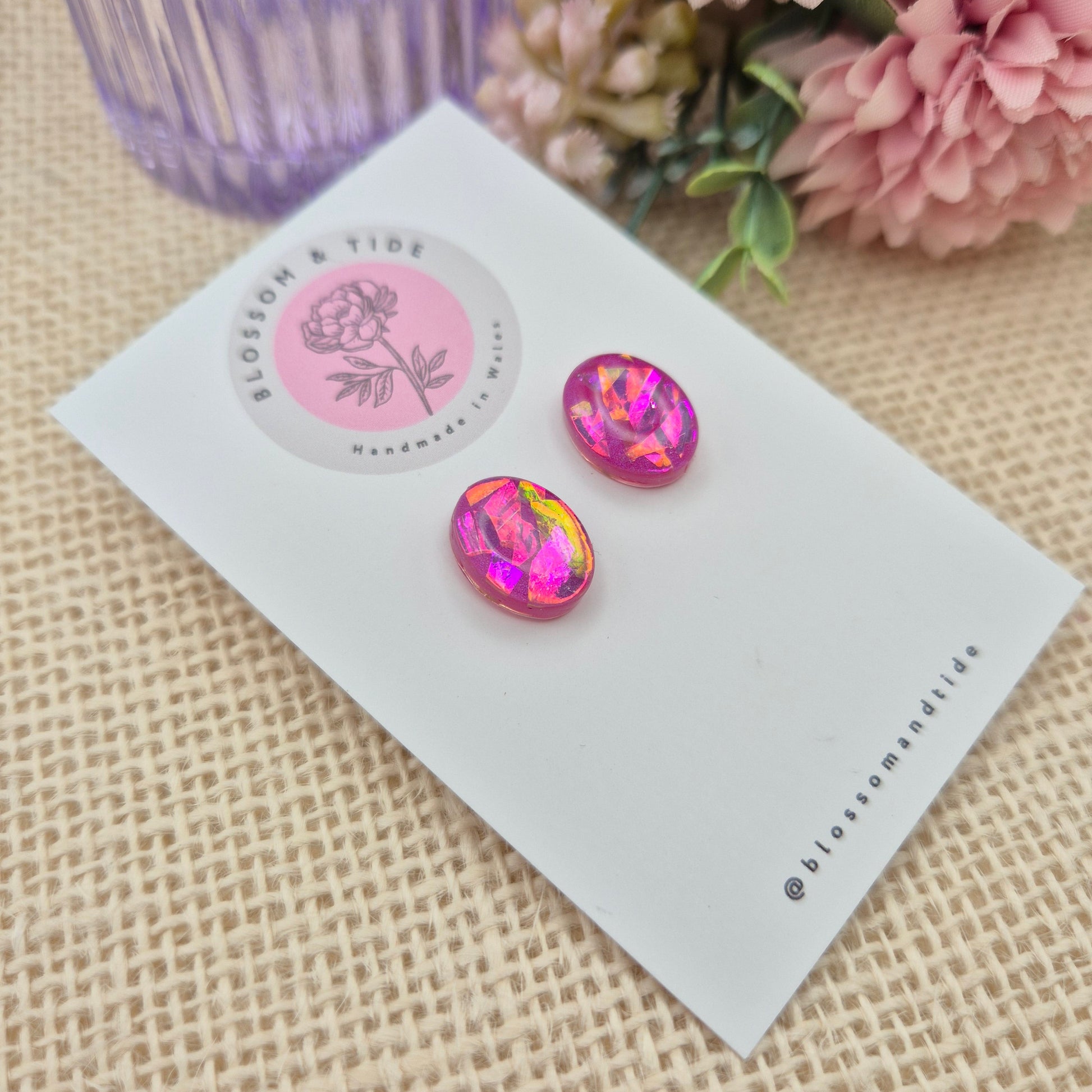  A pair of handmade pink oval stud earrings in hot pink and pale pink, with a shimmery finish, beautifully packaged in an organza bag and pip box.