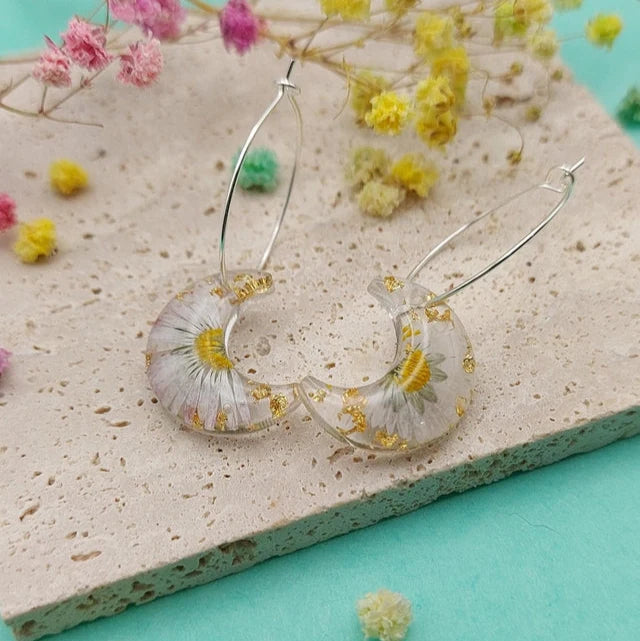 Handmade real daisy hoop earrings with pressed flowers and gold leaf accents