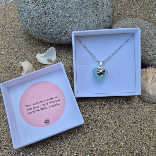 Sea glass necklace with shell charm in a gift box