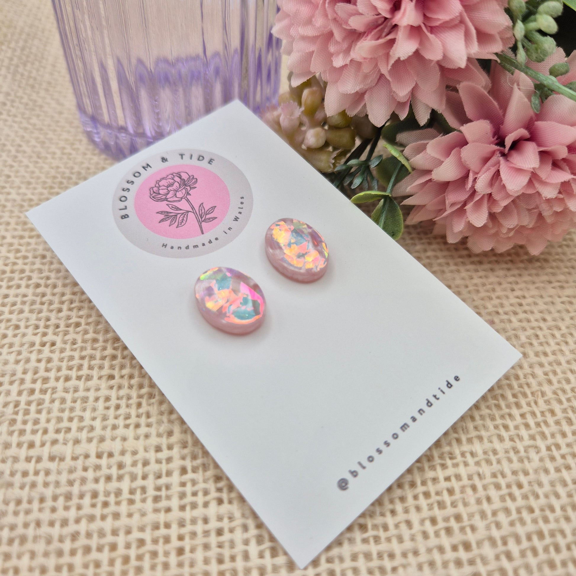  A pair of handmade pink oval stud earrings in hot pink and pale pink, with a shimmery finish, beautifully packaged in an organza bag and pip box.