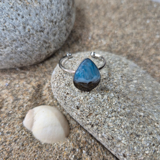 Teardrop adjustable ring with Welsh beach sand.