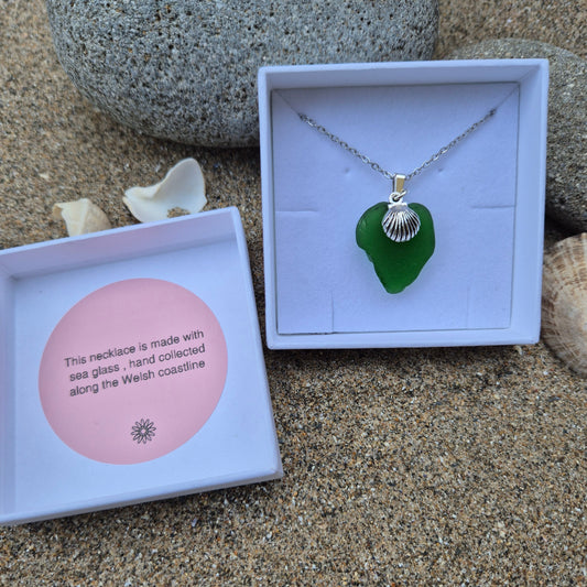 Sea glass necklace with shell charm in a gift box