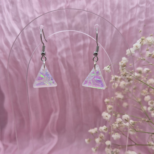 Triangle-shaped statement earrings reflecting colourful light, handmade in Wales