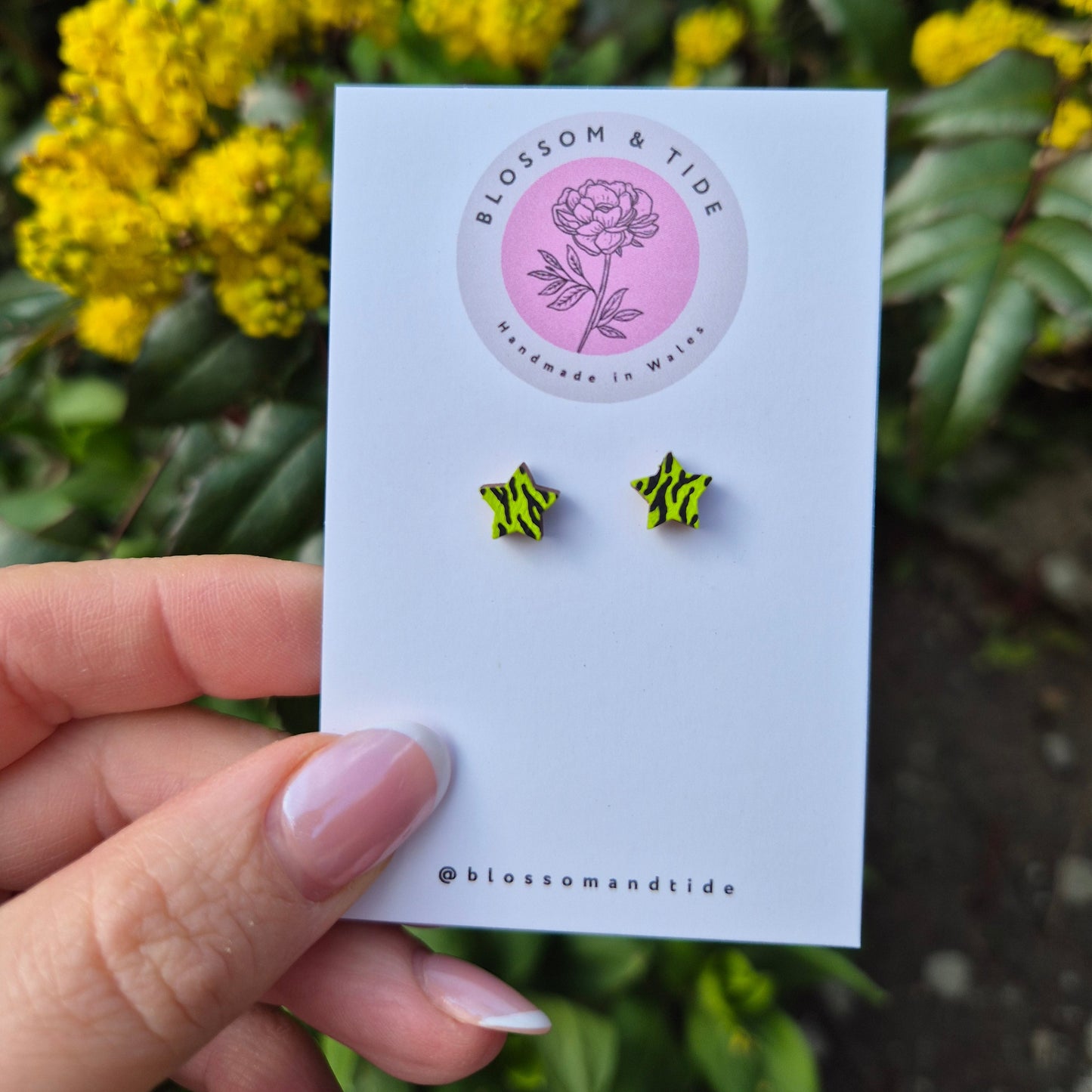 lime green hand painted animal print star earrings