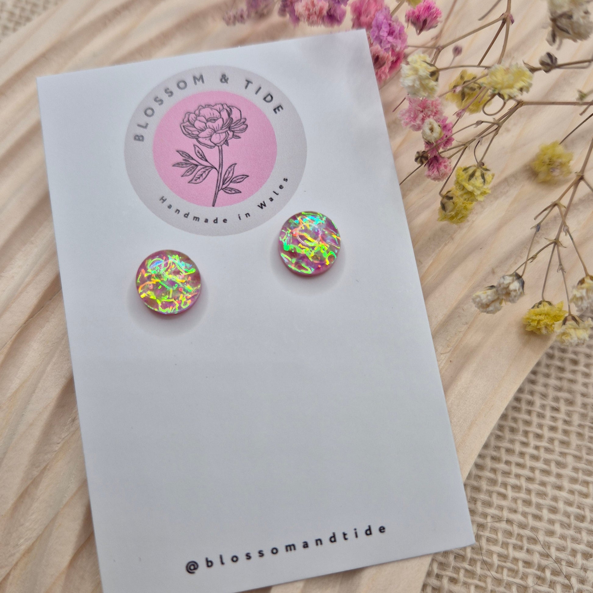 Handmade holographic resin earrings with dichroic effect on branded card
