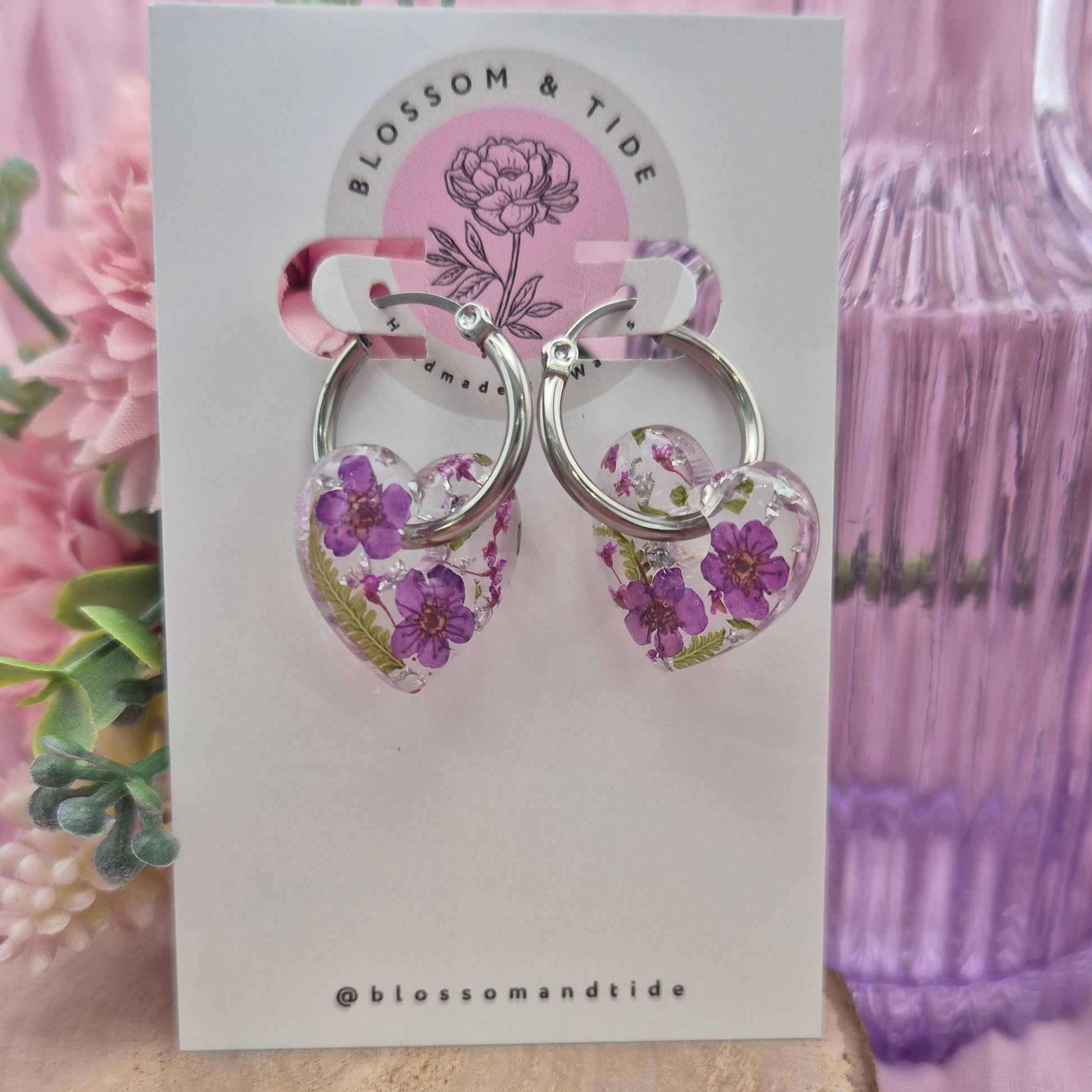 handmade purple flower hearts on silver stainless steel hoops