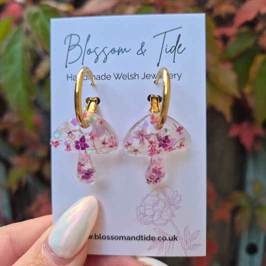 Purple pressed flower mushroom gold hoop earrings. On branded card. Handmade in Wales