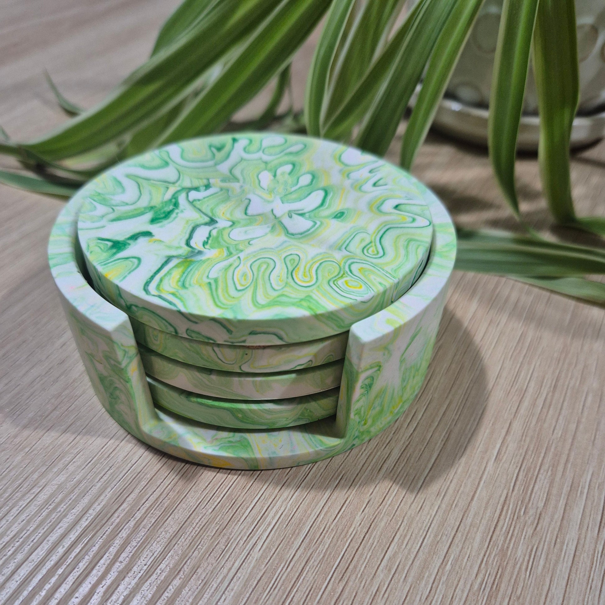 set of 4 coasters , green marbled design with matching holder