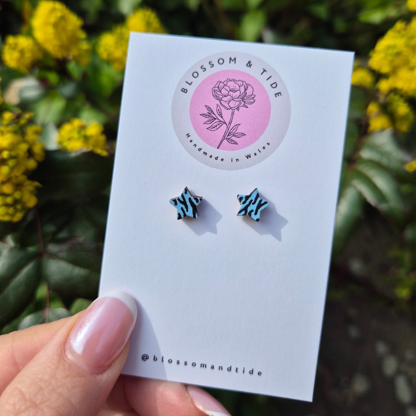 sky blue hand painted animal print star earrings